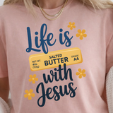 A 3x3 grid showing nine different women's graphic t-shirt color options, featuring slogans like 'Coffee & Jesus', 'Life is Sweet BUTTER with Jesus', and 'SIMPLY Blessed'.