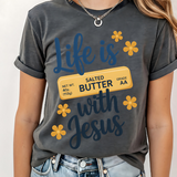 A 3x3 grid showing nine different women's graphic t-shirt color options, featuring slogans like 'Coffee & Jesus', 'Life is Sweet BUTTER with Jesus', and 'SIMPLY Blessed'.