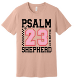 A 3x3 grid showing nine light peach-beige short-sleeve T-shirts, each with a different inspirational Bible verse or quote printed on the front in various colors and styles.