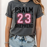 A 3x3 grid showing nine women modeling the same dark gray graphic T-shirt with different colorful text and design prints. The shirts feature phrases such as 'CHOSEN', 'TRUST', 'HIS NAVY IS BETTER', 'BIBLE PLANS HAVE TO BE RIGHT', 'PSALM 23 SHEEPHERD', and others with religious-themed graphics.