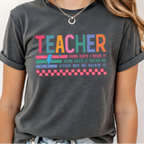 A 3x3 grid showing nine different colorful graphic t-shirts worn by a model. The shirts feature various teacher-themed designs including an apple with the word 'teach', a blue daisy pattern, a rainbow smiley face saying 'BELIEVE SUCCESSION MAKES A DIFFERENCE', a pink heart and book design, a pink and blue 'TEACH A MIDNIGHT' graphic, a rainbow lightning bolt, a patriotic 'TEACHER' design, the word 'teach' in pink script, and a gold glitter-style 'TEACH' graphic.