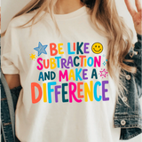 A 3x3 collage showing a woman wearing different colorful teacher-themed graphic t-shirts. The designs include a pink gingham apple, blue floral 'TEACHER' text, a rainbow subtraction quote, cartoon characters, a purple lightning bolt, a pink cross, and other decorative text prints.