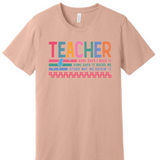 A 3x3 grid showing nine peach-colored short-sleeve t-shirts, each with a different colorful teacher-themed graphic design such as an apple, lightning bolt, and text slogans.