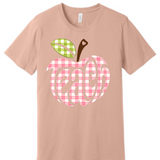 A 3x3 grid showing nine peach-colored short-sleeve t-shirts, each with a different colorful teacher-themed graphic design such as an apple, lightning bolt, and text slogans.
