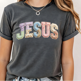 A 3x3 grid showing nine different dark gray graphic t-shirts modeled on a person. The shirts feature various colorful and white inspirational Christian-themed designs including 'HAPPY TO SEE YOUR FACE', 'TEACHER YOU ARE', 'AMEN TEACHERS', and 'JESUS'.