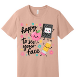 A 3x3 grid showing nine short-sleeve crew-neck T-shirts in a light peach-beige color, each with a different teacher-themed graphic print on the front, displayed against a plain white background.