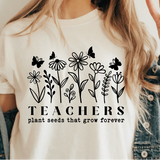 A 3x3 collage showing a woman wearing different colorful graphic T-shirts. Each shirt features a unique teacher-themed design, including quotes like 'HAPPY TO SEE YOUR FACE', 'Teaching is my joy', and 'TEACHER' with a bow, all paired with denim jackets.