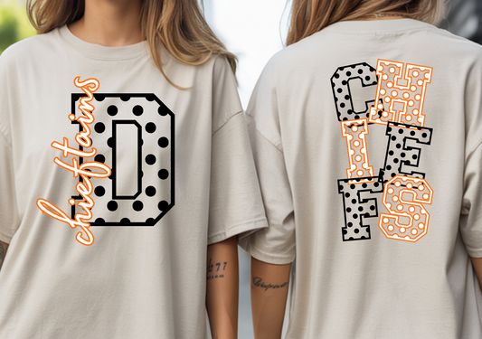 A woman modeling an oversized beige graphic T-shirt, shown from both front and back. The front has a large black polka-dot outlined letter D with orange script text reading 'chic fashion.