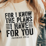 A 3x3 collage showing a woman wearing different printed white T-shirts. Each shirt features a colorful inspirational Bible verse or quote design, including references to Chosen, Trust, His Way Is Better, Jesus Made Me A Teacher, Psalm 23 Shepherd, and other verses.